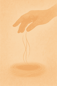 Hand catching falling hair strands into a nest-like cushion, in warm comforting tones.
